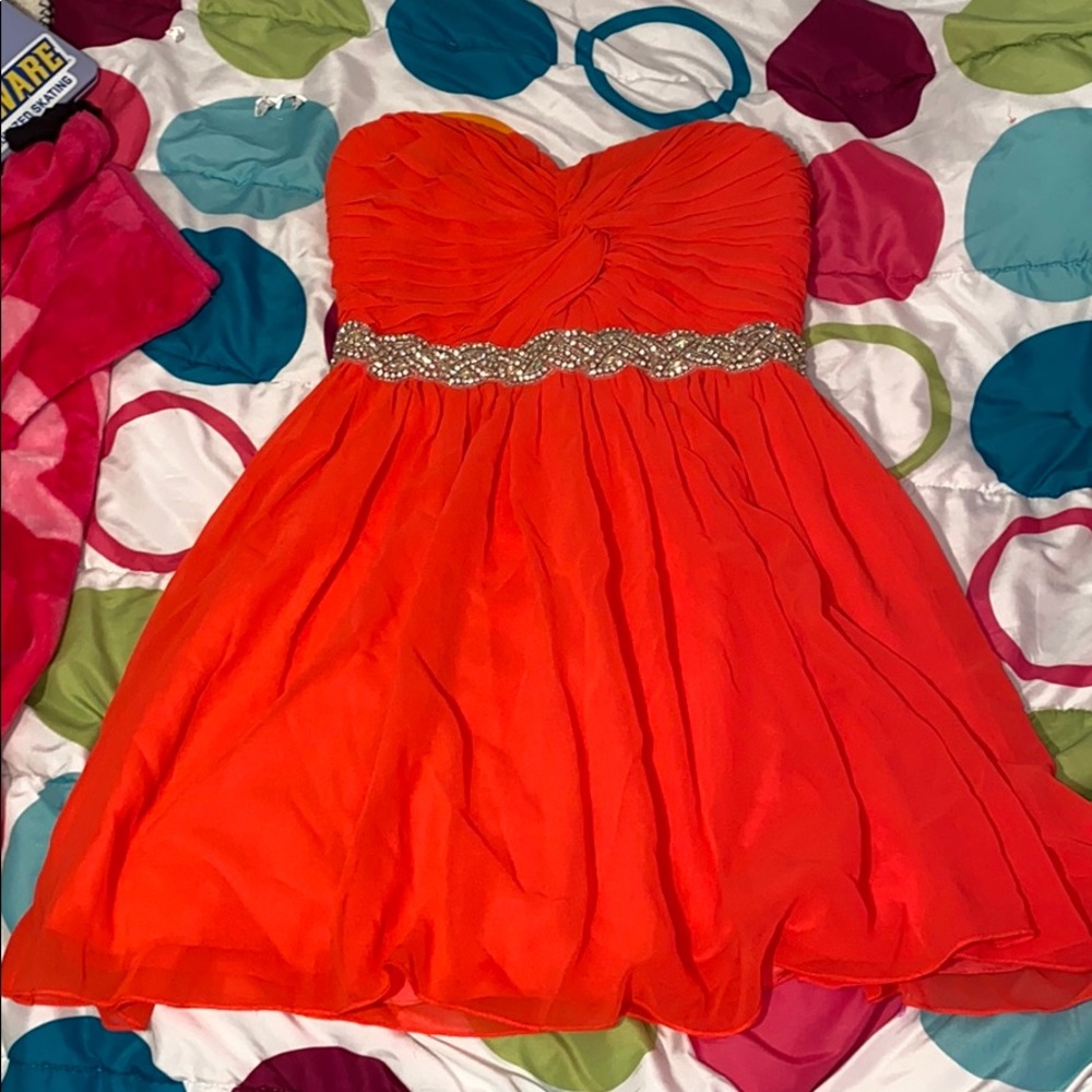 Coral color formal dress. Strapless size 7